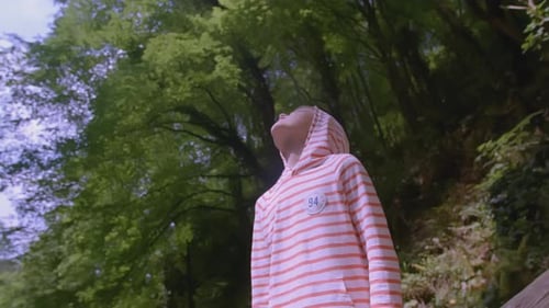 Boy Walks in Wild Forest in Summer Creative Boy Enjoys and Has Fun Walking in Wild Forest in Summer