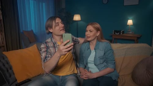 Loving Couple Video Chatting with Friends