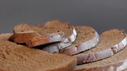 Baked Bread Loaf of Bread Fresh Bakery Products on Wooden Board Healthy Food Concept Top View Slices