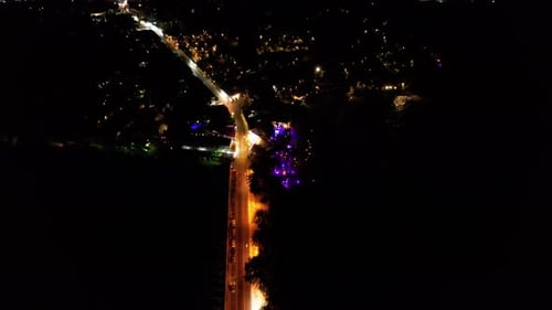 Top View of the Night City and Illuminated Road