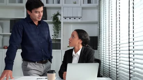 Business People Conversation in Modern Office Setting