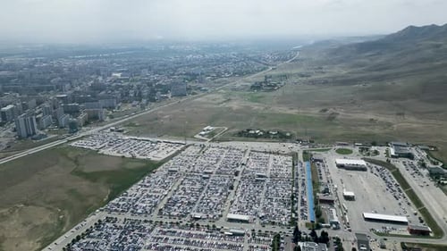 Aerial View of Expansive City Car Parking Lot