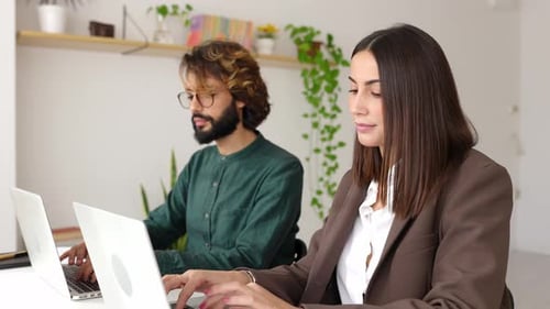 Pretty Female Worker Smiling at Camera Sitting at Workplace Office