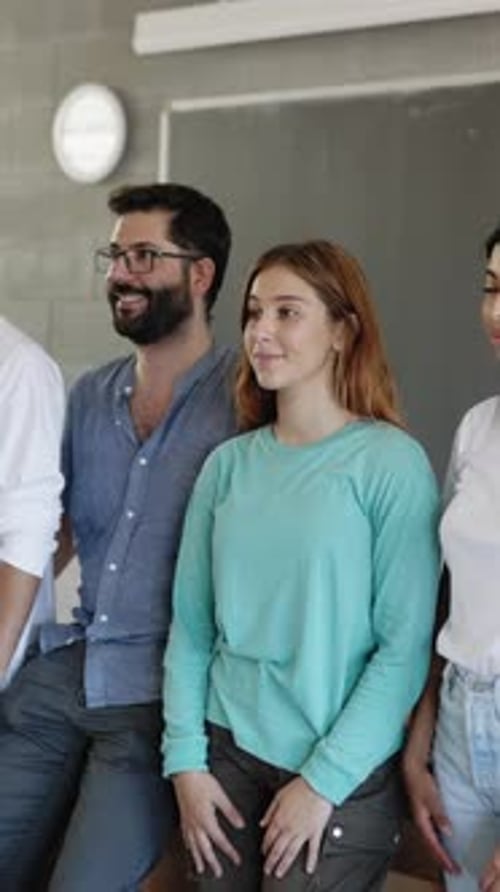 Multiracial Teenage High School Students Taking Photo Group with Male Teacher