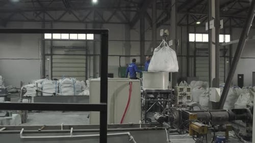 Workers Control Building Material Production in Workshop