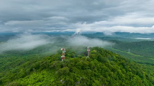 Mist flowing over the summit Above is a telecommunications station