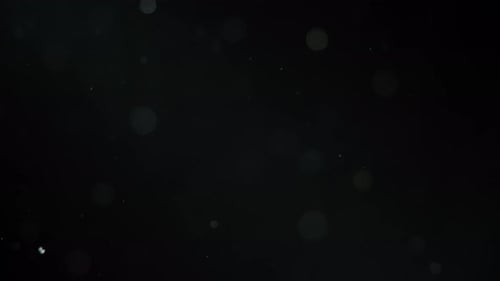 Abstract bokeh dust particles