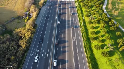 Short bird's eye view drone shot of a highway.
