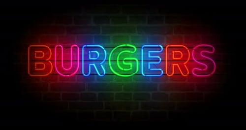 Burgers bar neon on brick wall loop