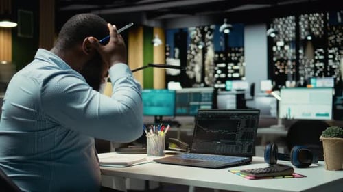 Angry Concerned Black Man Losing Money with Forex Trend Going Down