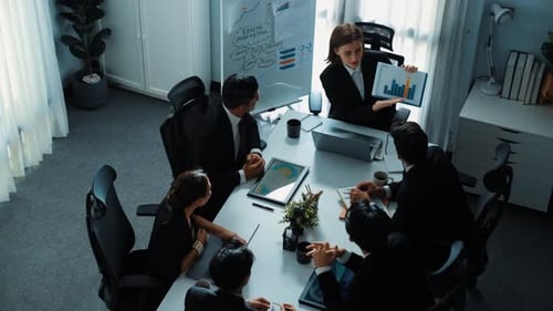 Top view of manager show increase sales chart while team clap hand. Directorate.