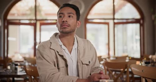 Check time, wait and man in a restaurant, stress and frustrated with reaction and unhappy