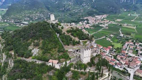 Camera panning around medieval castle ruins on mountain top