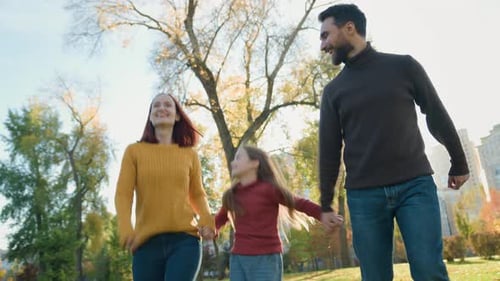 Happy Caucasian People in City Park Forest Nature Autumn Spring Sunny Good Weather Family Mom Dad