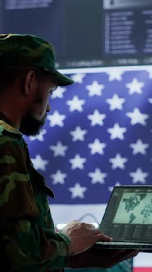 Vertical Video US Soldiers Operating in a High Tech Cybersecurity Command Post