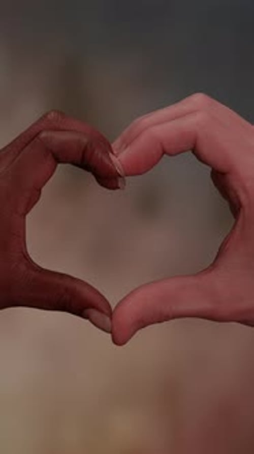 Unity and Love An Image of Hands Coming Together to Form a Beautiful Heart Shape