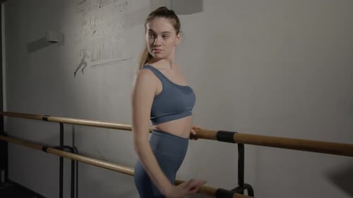 Portrait of Graceful Pretty Ballet Dancer Rehearsing in Dance Studio