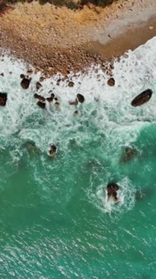 Beach and sea waves top vew