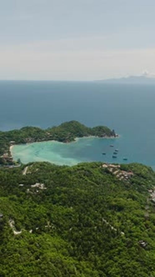 Island Coastline with Turquoise Bay and Dense Greenery Koh Tao Thailand