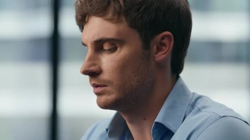 Close Up Focused Businessman Working in Office