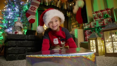Smiling Child with Christmas Gift in Cozy Home