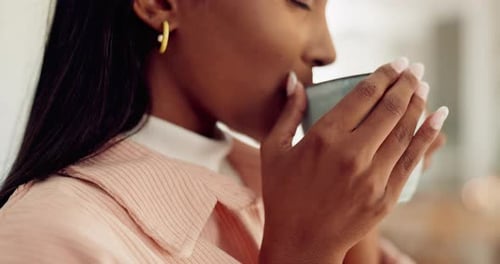Woman Drinking Coffee in Close Up Portrait
