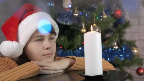 Dreaming Teen By Christmas Candle