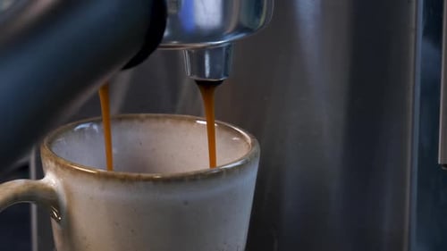 Close Up Creamy Espresso Coffee Brewing With Home Espresso Machine