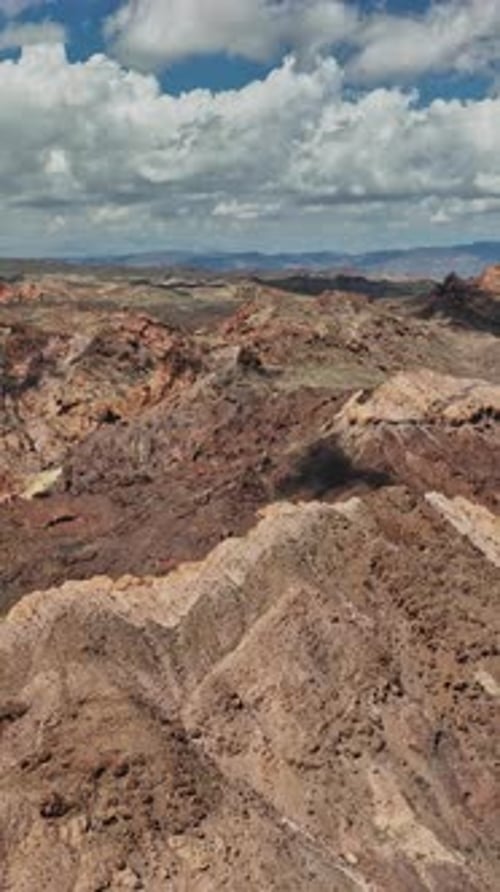 Stunning aerial view of Nevada's rugged terrain with distant mountains