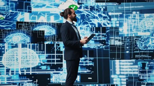 Entrepreneur Uses Laptop to Review Artificial Intelligence Brain System