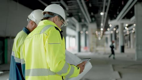 Construction Workers Indoors Two Engineer Man Building Planning Construction Site Drawing Blueprint
