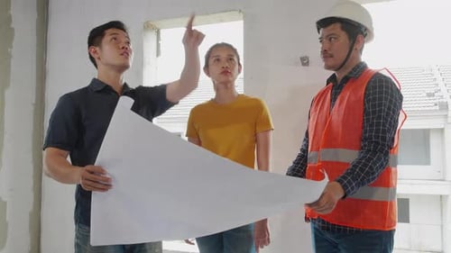 construction engineers, owner discussing together about village project, real estate