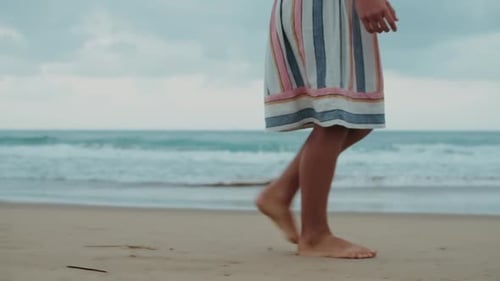 Unrecognizable Woman Enjoying Rest at Summer Sea Coastline. Unknown Girl Legs Walking