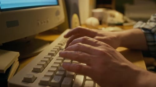 Typing on Retro Computer Keyboard in Office