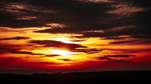 Dramatic Sunset Over Black Forest Landscape