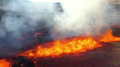 Hot Exploding Lava During Fagradalsfjall Volcano Eruption In Iceland - drone shot