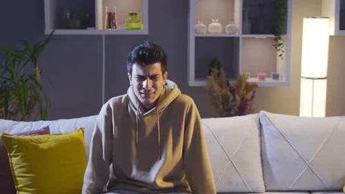 Frustrated crying young man. Crisis, failure.