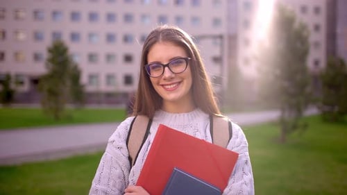 Woman Student Outdoors Smiling Education on Background of Campus University