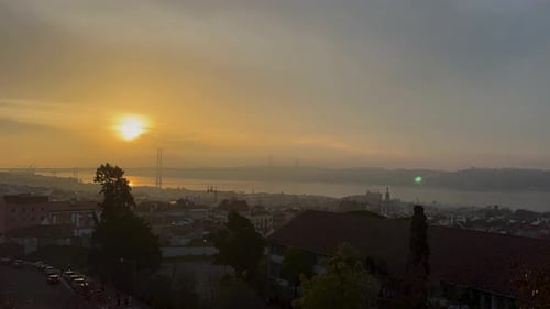 Beautiful sunrise over Bridge of 25th April, Lisbon, Portugal. Famous