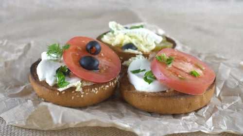 Sandwiches with cheese, tomatoes and herbs