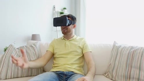 Man Experiencing Virtual Reality While Sitting on Couch