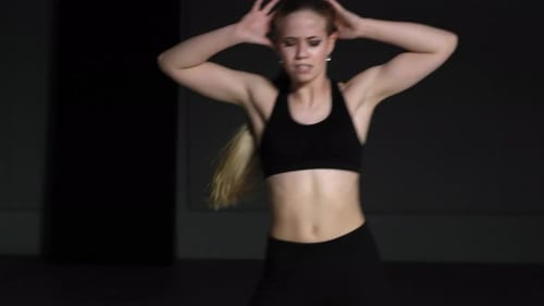 Energetic Young Woman Choreographer Dancing in Studio