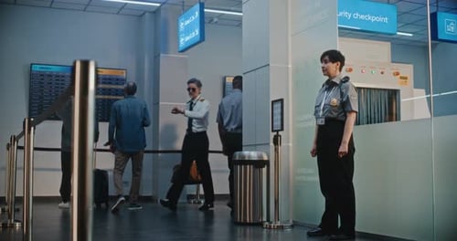 Crowded Airport Terminal Diverse Passengers Airline Pilot and Two Flight Attendants Walking for