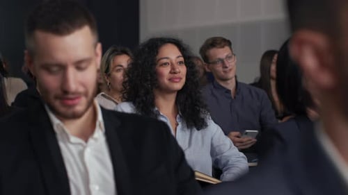 Group of People Listens Speech at Business Conference. Stage Talk at Summit