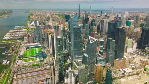 Vibrant New York city on amazing sunny day. Rising sight of the city, river and docks.