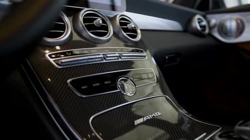 Close Up of Car Interior with Carbon Fiber Design
