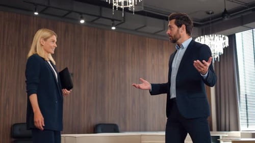 Business Professionals Handshake in Modern Office Setting