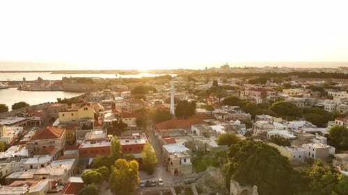Rhodes old town houses and surrounding fortifications at sunrise, Greece