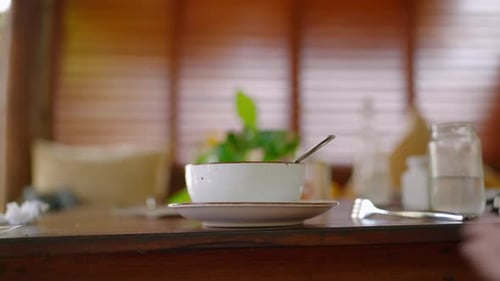 White Ceramic Plate on Table Blurred Background Female Hands Taking Dish in Hipster Cafe Tasty