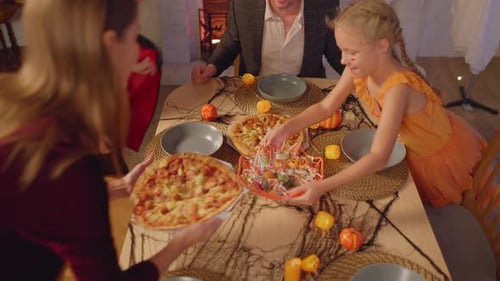 Happy Family Celebrates Halloween Birthday Party at Home